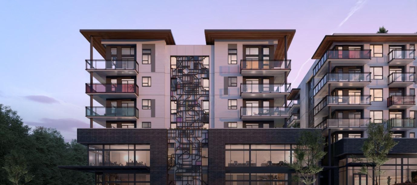 Building with green and white panels